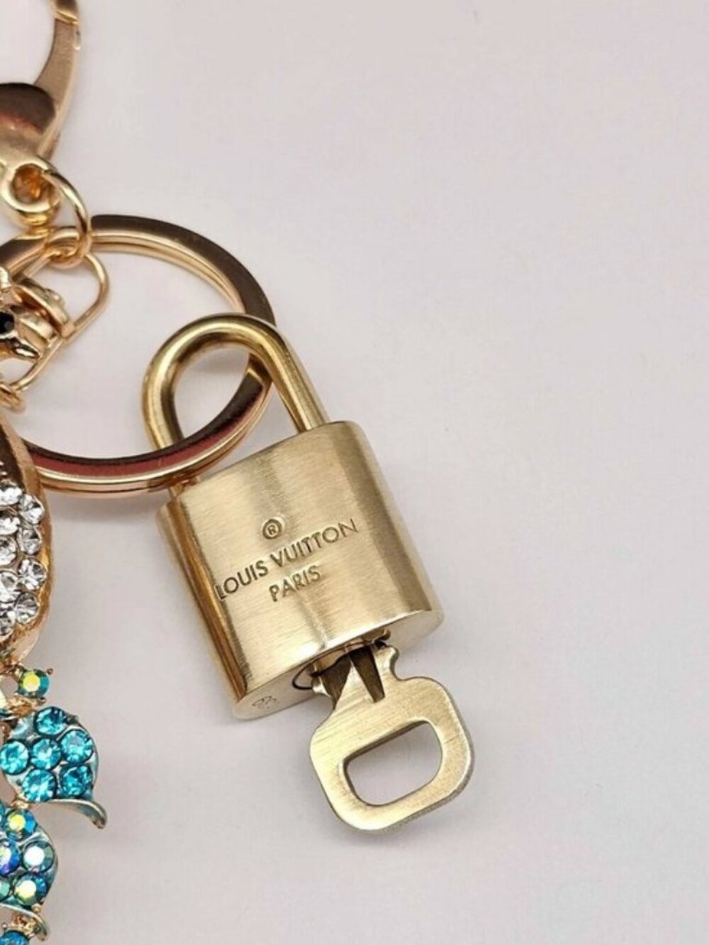 Authentic Louis Vuitton Gold Lock 🔒 Unbranded Peacock Keychain Bag Charm LV - Picture 8 of 9
